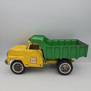 Vintage Hubley Metal Dump Truck Green And Yellow 1960's 11" Long Good Condition.